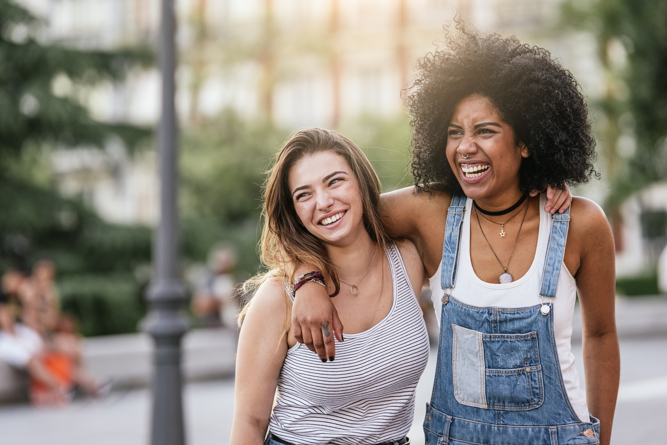 Beautiful women having fun in the street. Youth concept.