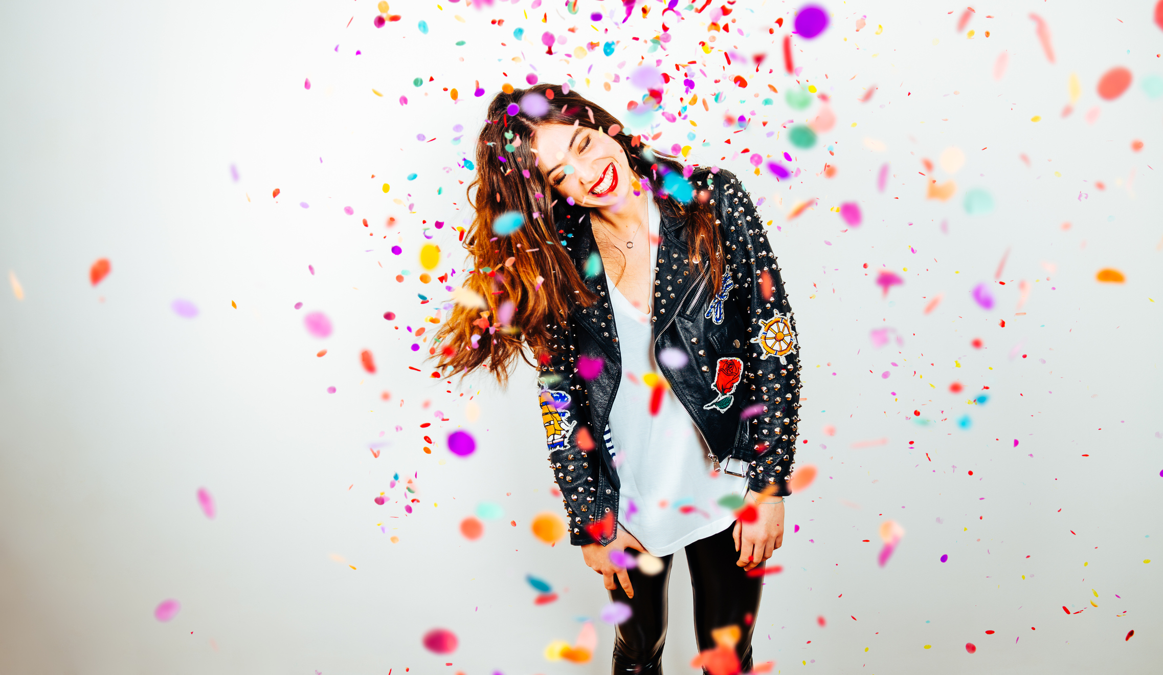 Happy party woman with confetti